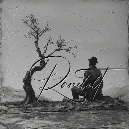 Monochrome image of person sitting beside a windblown tree, with "Randolf" written in cursive across the front.