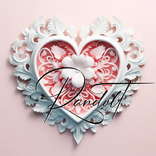 Intricate white heart-shaped ornament with floral design and cursive text on a pink background.