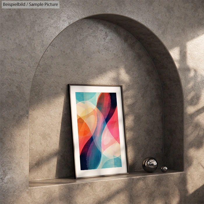 Colorful abstract painting placed on arched niche shelf with reflective sphere and textured wall backdrop.