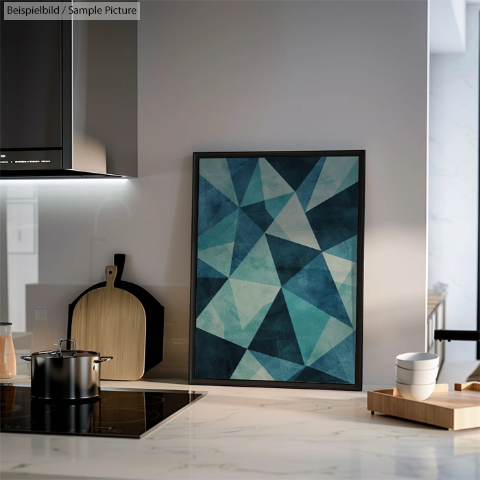 Modern kitchen with geometric artwork, cutting boards, pots, and wooden spice rack on a sleek countertop.