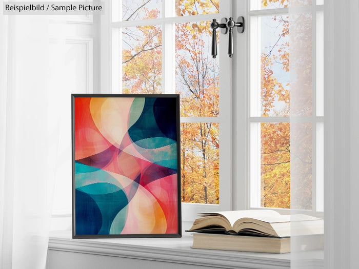 Abstract painting with colorful geometric shapes on a window sill, autumn leaves visible outside.