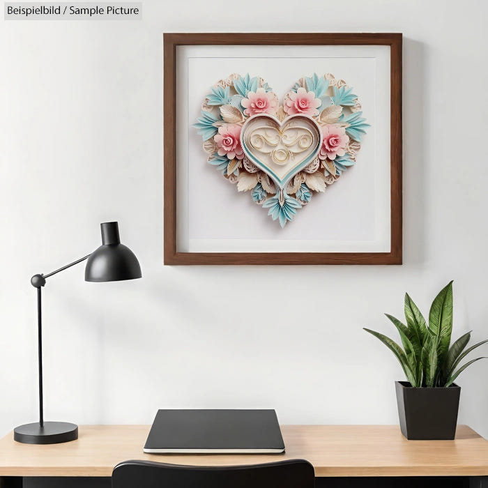 Wall art of a 3D heart with floral designs above a desk, lamp, and potted plant.