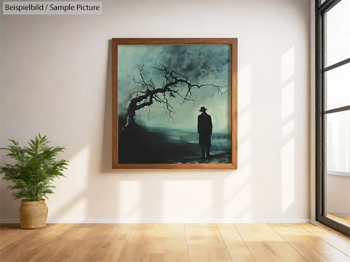 Framed painting of a solitary figure under a leafless tree on a wall in a bright room.