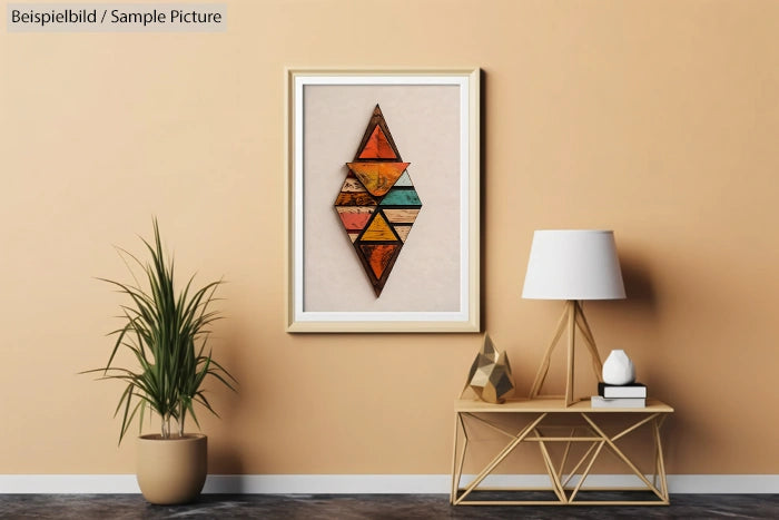 Contemporary geometric art on neutral wall; framed print, lamp, potted plant, and decorative shelf in modern living room.