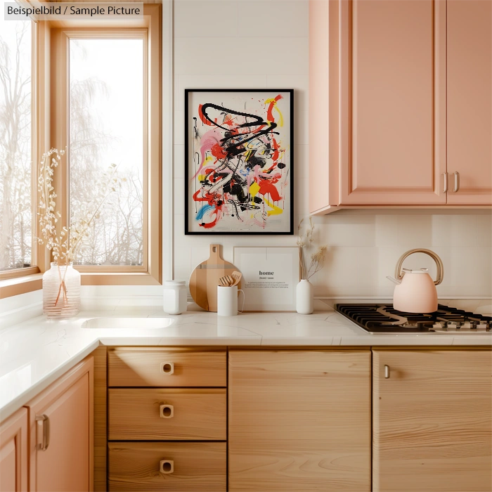 Modern kitchen with light pink cabinets and abstract painting on the wall.