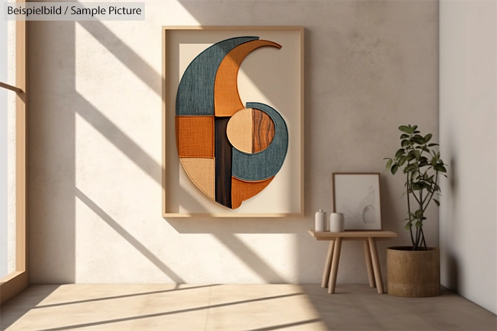 Modern art piece with blue, orange, and brown shapes in a minimalist room with sunlight and a small bench plant.