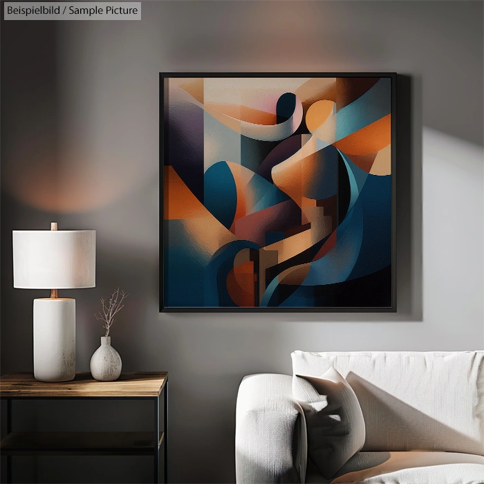 Contemporary abstract painting with warm tones on a living room wall beside a lamp and side table with decor.