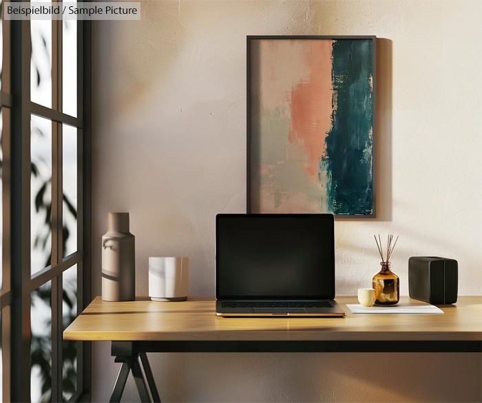 Modern workspace with laptop on desk, abstract painting on wall, and decorative items by window.