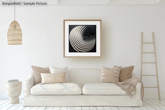 Minimalist living room with beige sofa, decorative pillows, abstract geometric wall art, and neutral decor accents.