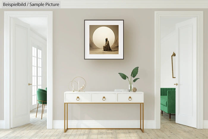 Stylish minimalist living room with white console table, green chairs, and framed artistic photograph on the wall.