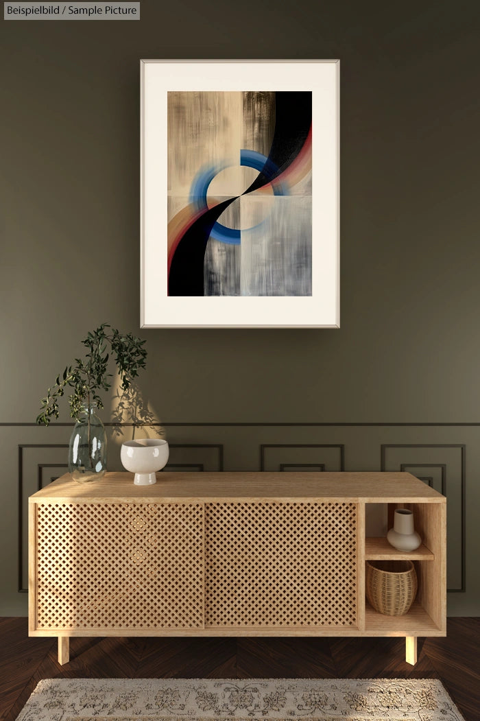 Modern art piece with abstract geometric forms on a wall above a wooden console table with vase and decor items.