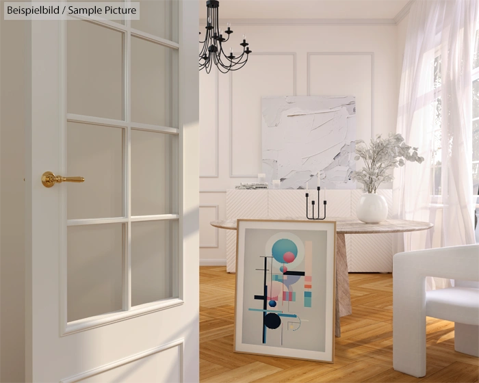 Modern living room with abstract art, white furniture, and wooden flooring, illuminated by natural light.