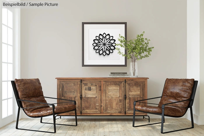 Modern living room with two leather chairs, a rustic wooden cabinet, and framed wall art in a neutral-toned setting.