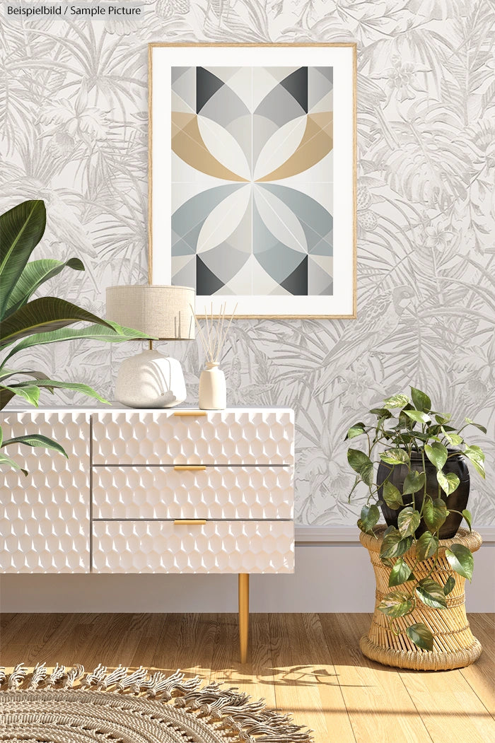 Modern living room with abstract art, patterned wallpaper, white dresser, and indoor plants on wooden floor.