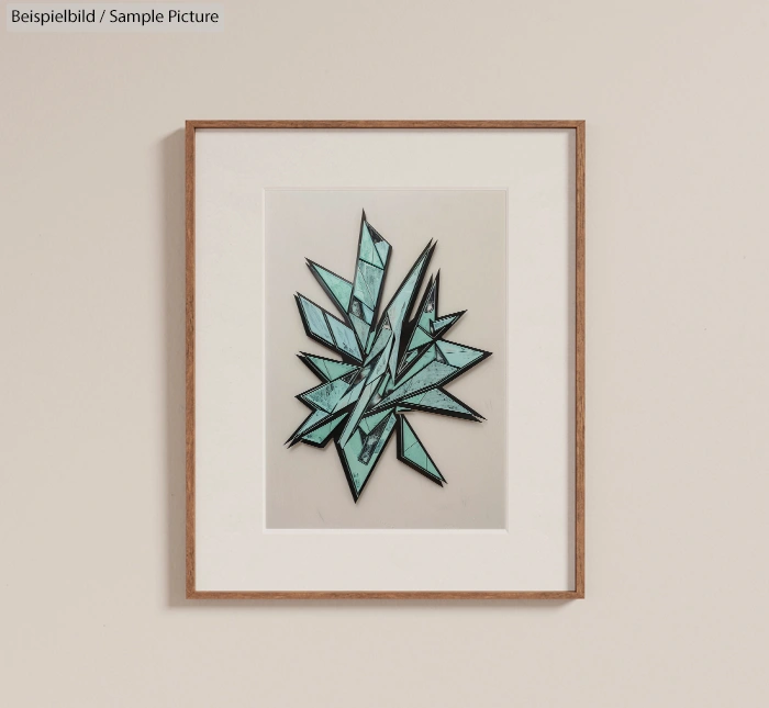 Framed geometric abstract art with teal and black triangular shapes.