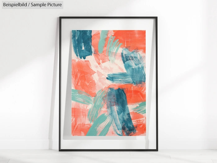 Abstract painting with bold teal and coral brushstrokes in a black frame against a white wall.