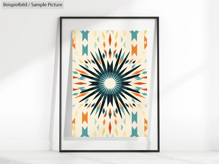 Framed geometric art print with a central starburst pattern in teal, orange, and beige on a white background.