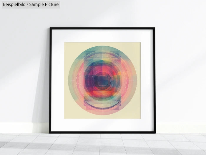 Framed abstract art with circular rainbow patterns on a beige background, mounted on a white wall.