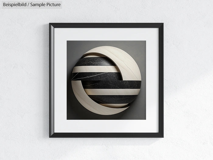 Framed spherical abstract art with black and white segments on a grey background.