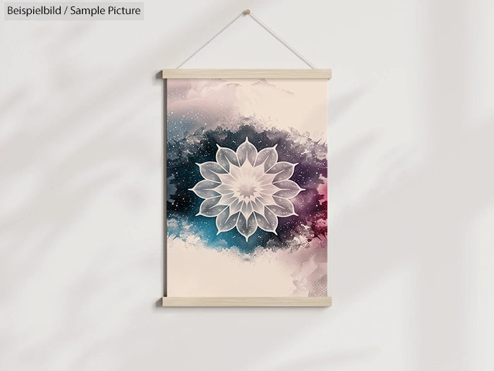 Hanging wall poster with a white floral mandala design over a colorful, cloudy background.