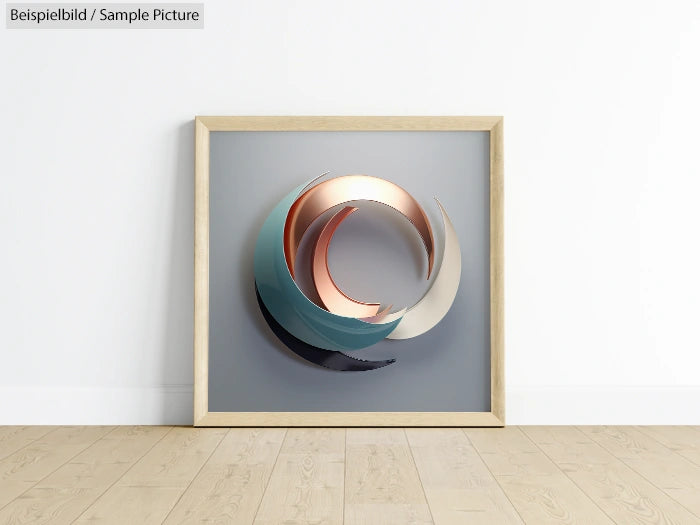 Framed abstract art with metallic and matte swirl shapes on a gray background, set on a wooden floor.