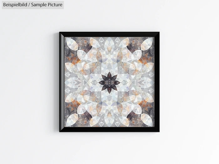 Framed geometric abstract art with grey, white, and orange patterns on a light wall.