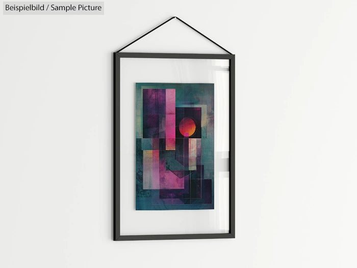 Framed abstract art print with geometric shapes in purple and green hues, hanging on a white wall.