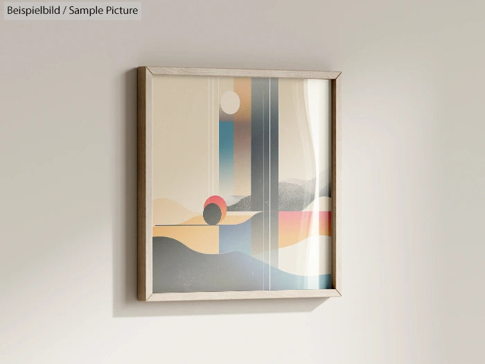 Framed abstract art with geometric shapes and earthy tones on a light wall.