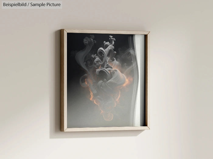 Framed abstract art with swirling smoke-like patterns in black and orange tones on a neutral wall.