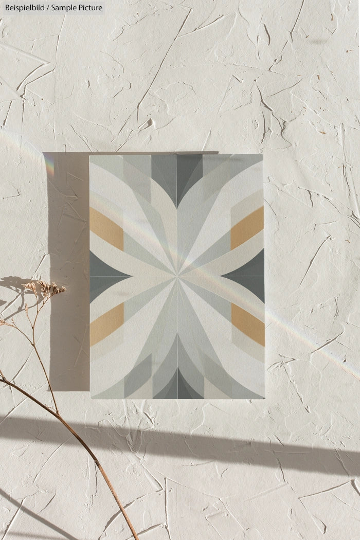 Geometric abstract art with symmetrical shapes in beige, gray, and olive tones on textured background.