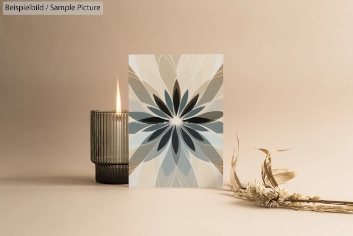 Decorative leaf pattern card next to a candle and dried flowers on a beige background.