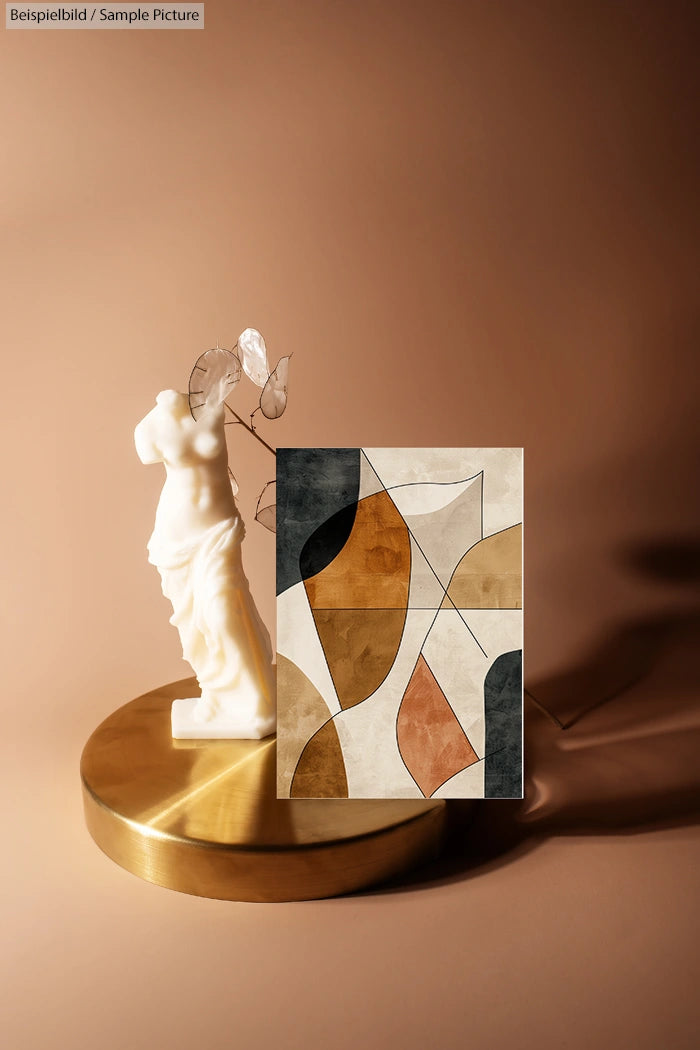 Statue of Venus on gold stand beside abstract art with geometric shapes in earth tones.