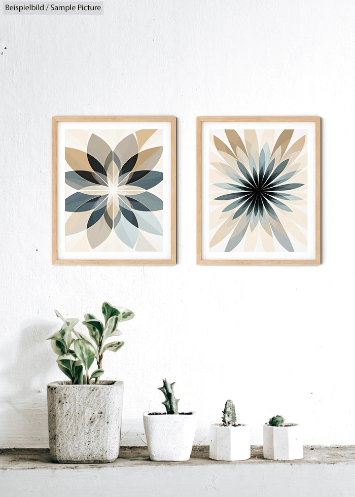 Two geometric floral art pieces in wooden frames on white wall, with potted plants below.