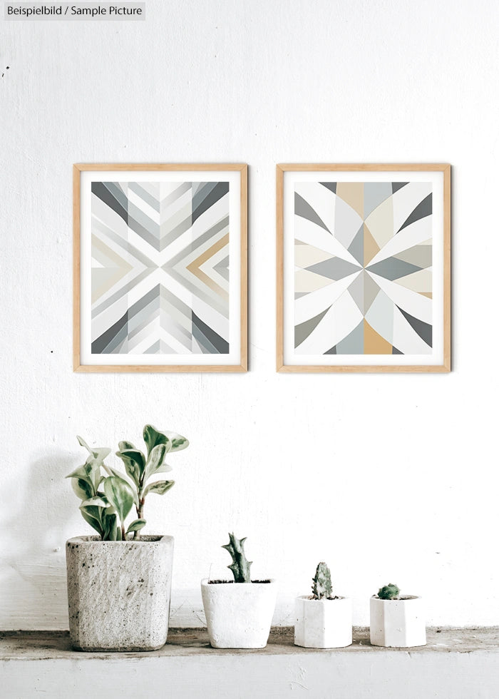 Two abstract geometric art pieces with gray and beige tones, hung above potted plants against a white wall.