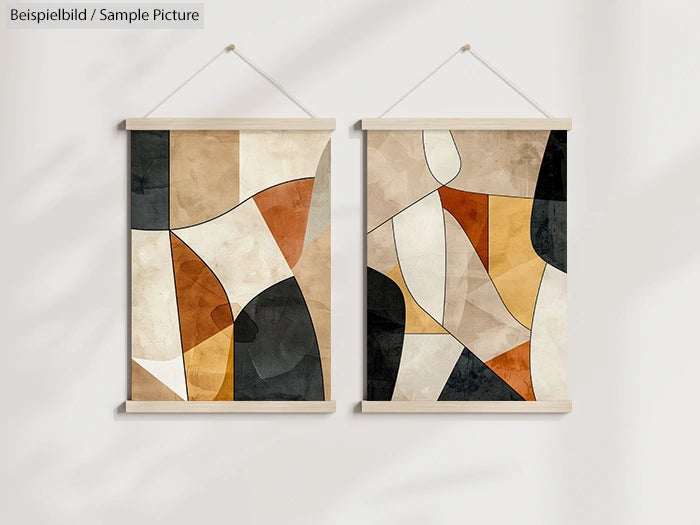 Pair of abstract geometric art prints with earthy tones, featuring curves and angular shapes, hanging on a light wall.