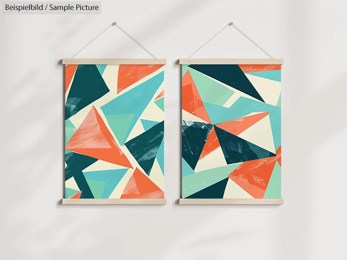 Abstract geometric art print with triangles in teal, coral, and cream. Two identical posters hung side by side.