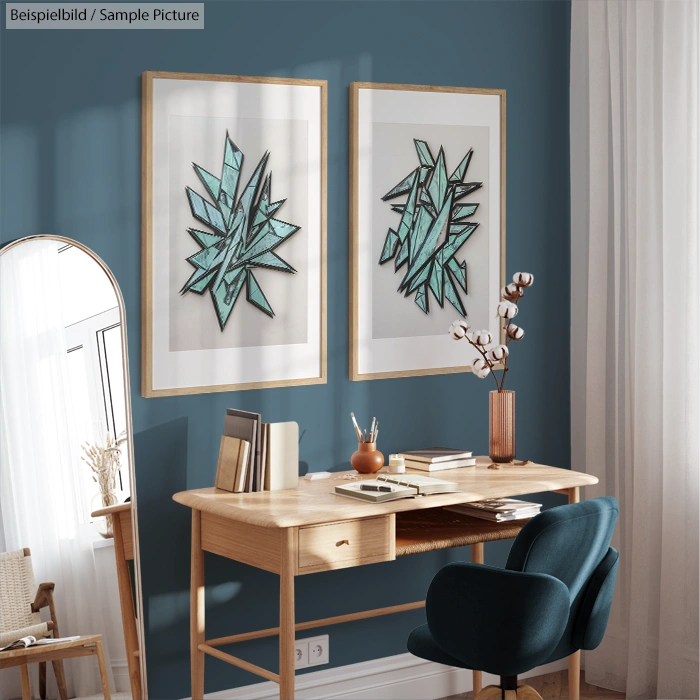 Stylish home office with wooden desk, blue chair, and abstract leaf artwork on teal wall.