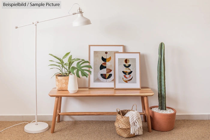 Interior with wooden bench, abstract art frames, lamp, plants, and cactus.