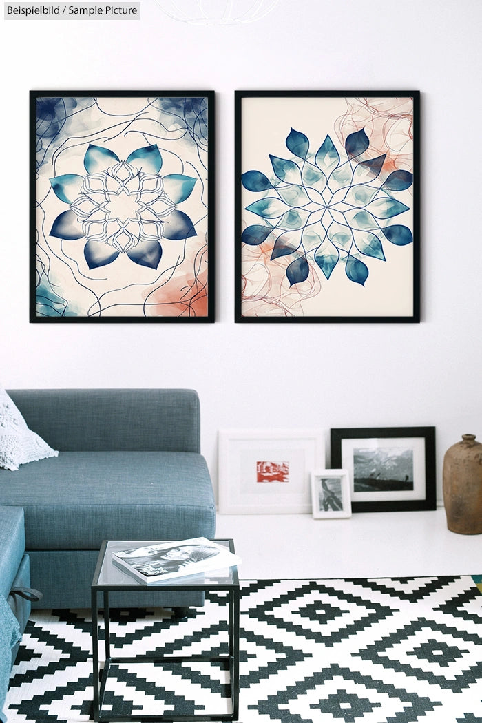 Modern living room with blue couch, geometric rug, and two abstract mandala paintings on the wall.