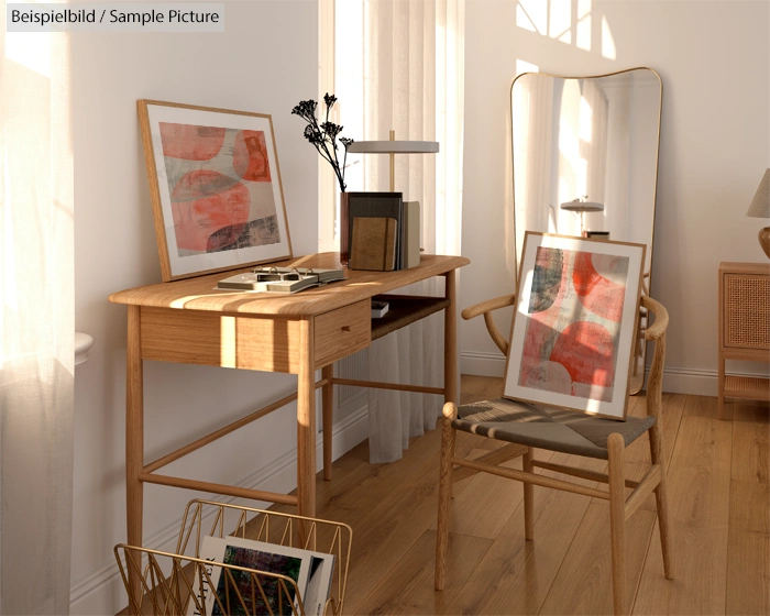 Cozy home interior with wooden desk, chair, framed abstract art, and natural sunlight streaming through a window.