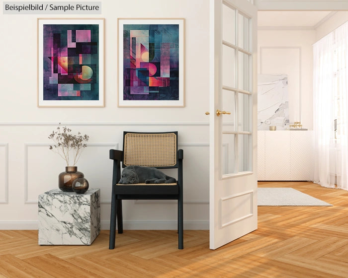 Stylish room with two abstract paintings, a black chair, and a marble pedestal. Wooden floor with ample lighting.