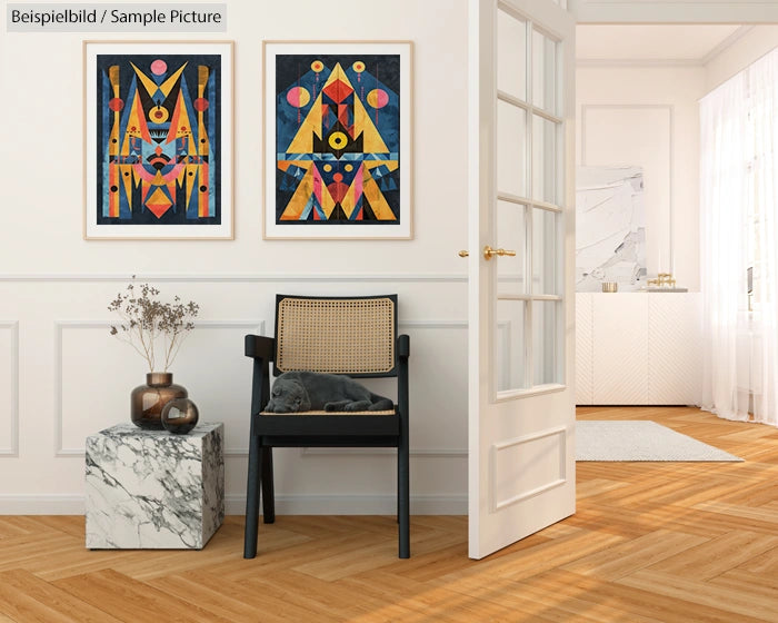 Modern living room with abstract art, marble side table, black chair, and wooden flooring.