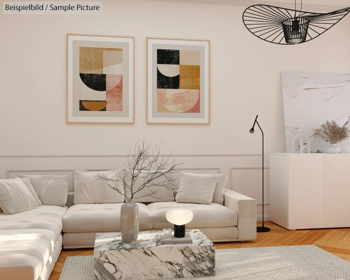 Modern living room with abstract art, white sofa, marble coffee table, and contemporary lighting fixture.