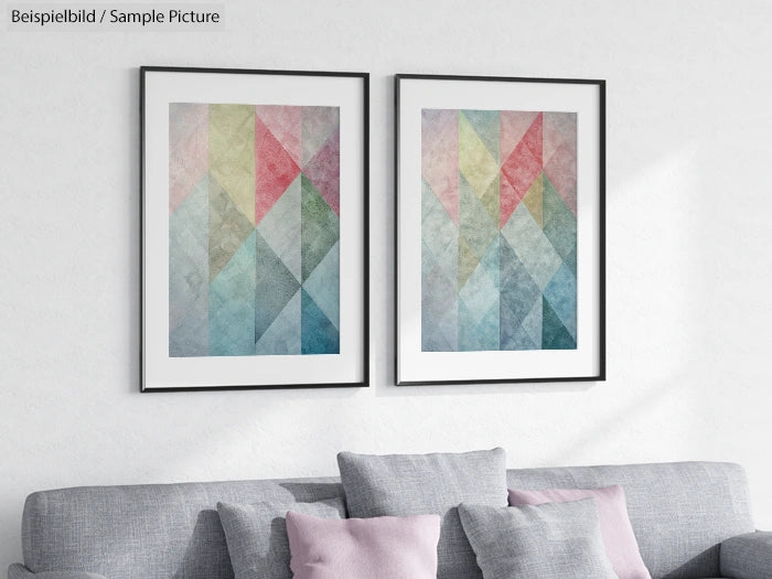 Living room with gray sofa and abstract geometric artwork in pastel colors on the wall.