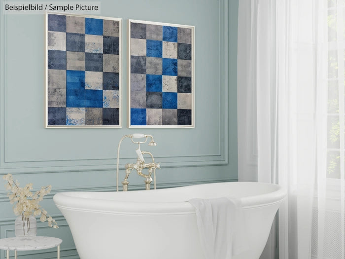 Modern bathroom with freestanding bathtub and blue abstract artwork on gray walls.