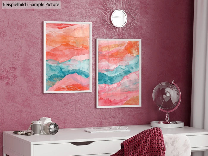 Modern room with pink textured wall, two abstract paintings, a globe, and a camera on a white desk.