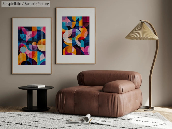 Minimalist living room with abstract art, brown leather chair, and modern lamp.