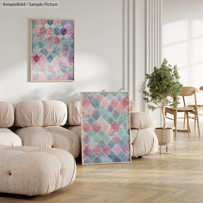 Cozy living room with abstract geometric artwork on wall, cushioned sofa, potted plant, and wooden floor.