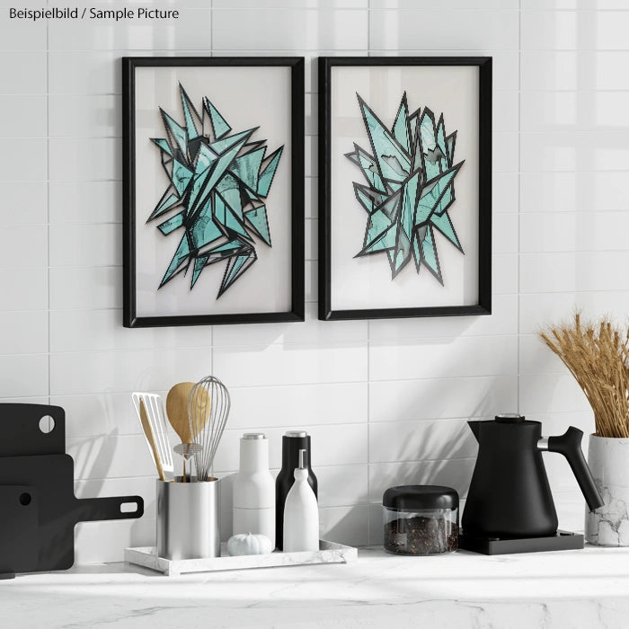 Modern kitchen decor with abstract teal art, utensils in a silver holder, black kettle, and jars on a marble counter.