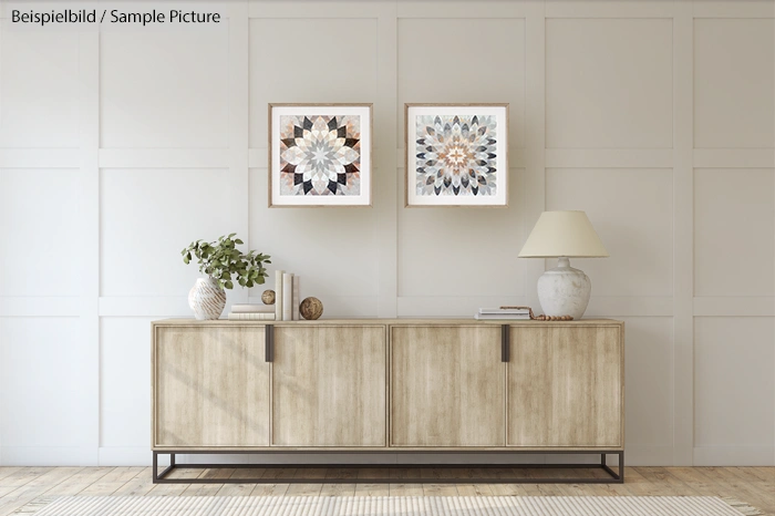 Modern living room with wooden sideboard, two framed floral artworks, and neutral decor elements.